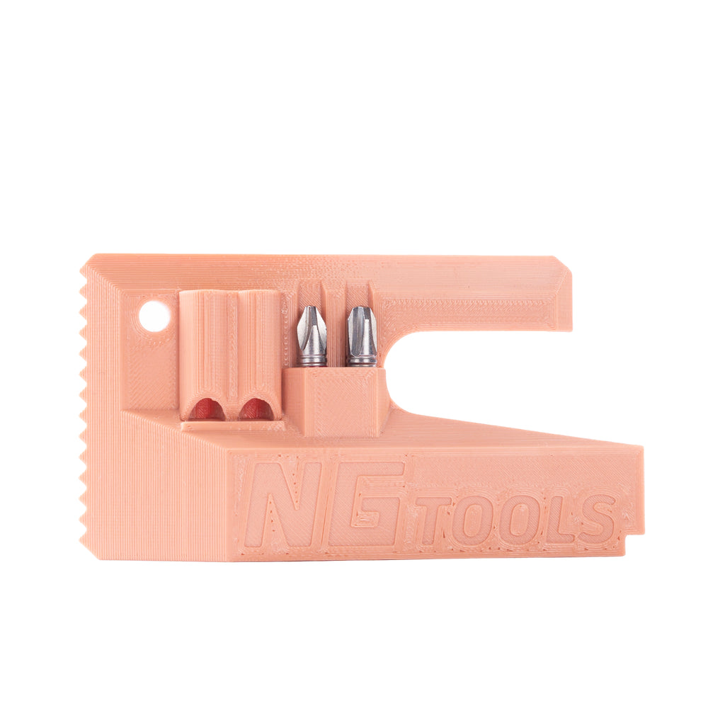 NG Snowboard Binding Tool – old pink multitool for snowboard, splitboard, and skialp. Includes screwdriver, two bits, and a whistle. Ideal for tuning bindings, buckles, base, edges, and waxing.