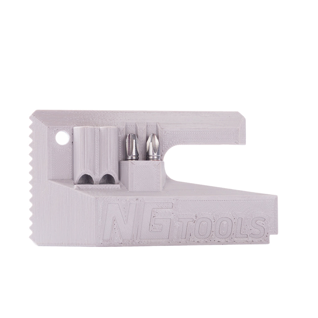 NG Snowboard Binding Tool – silver multitool for snowboard, splitboard, and skialp. Includes screwdriver, two bits, and a whistle. Perfect for tuning bindings, buckles, base, edges, and waxing.