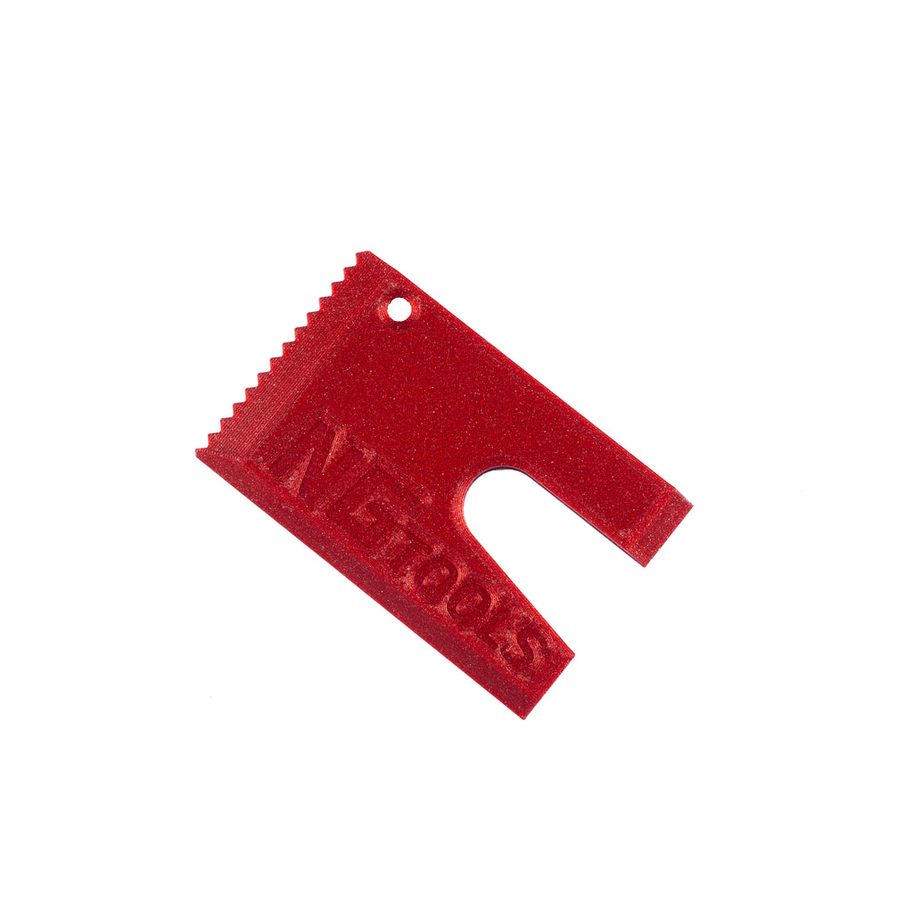 NGTOOLS Small Snowboard Binding Multitool in red. Compact and durable tool for snowboarders, shapers, skialping, and splitboarding. Ideal for quick binding adjustments and gear maintenance.