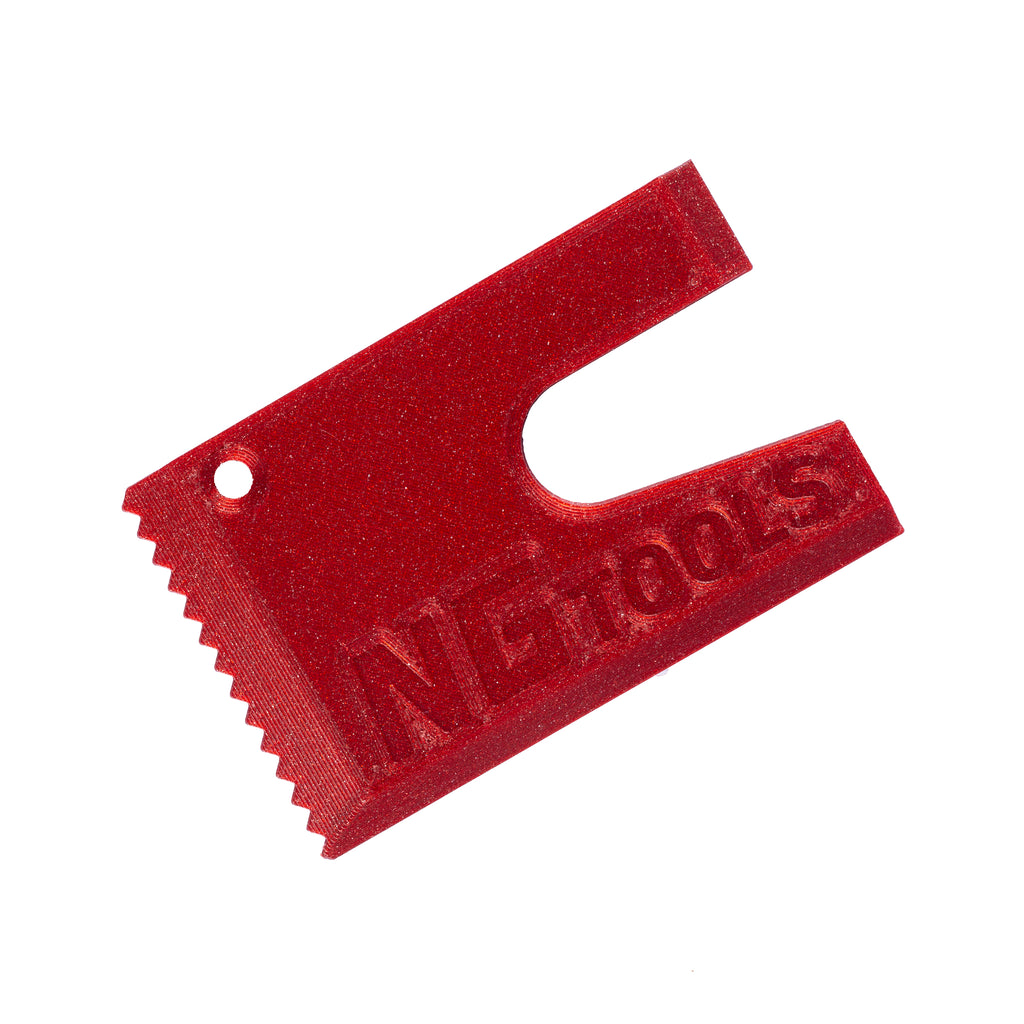 NGTOOLS Small Snowboard Binding Multitool in red. Compact, durable, and essential for snowboarders, shapers, skialping, and splitboarding. Perfect for quick binding adjustments and gear maintenance.