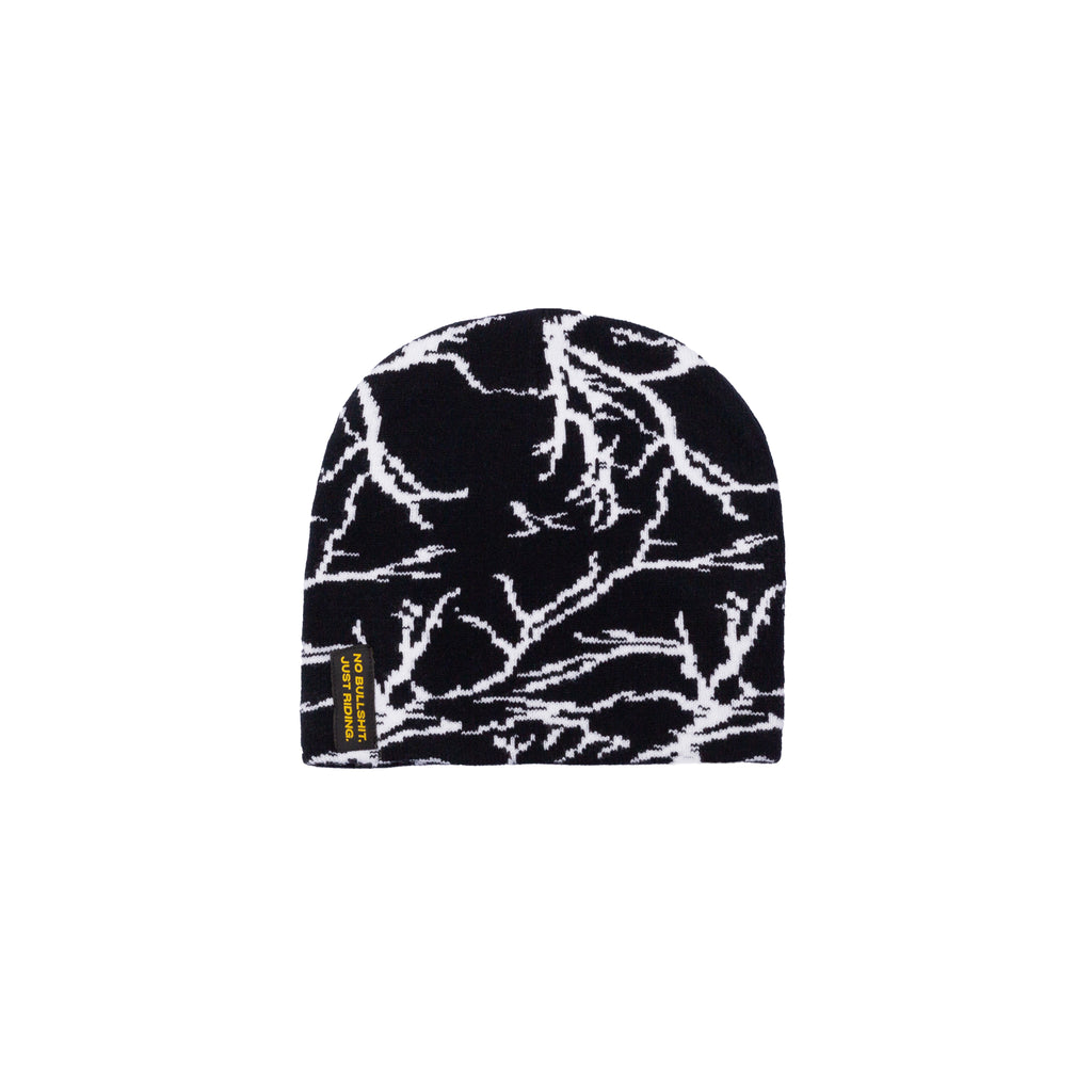 Stay warm and stylish with the NG Graphic Beanie. Featuring bold graphics and our signature 'No Bullshit, Just Riding' label, it's perfect for snowboarding, skiing, and everyday winter wear. 100% acrylic for comfort and durability. Shop now! Black Flash on Snow. Model. Absolut Park.