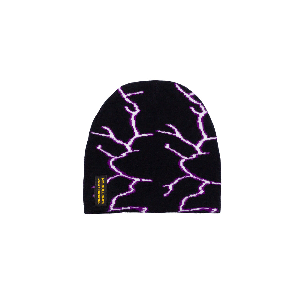 Stay warm and stylish with the NG Graphic Beanie. Featuring bold graphics and our signature 'No Bullshit, Just Riding' label, it's perfect for snowboarding, skiing, and everyday winter wear. 100% acrylic for comfort and durability. Shop now! Purple Flash on Snow.