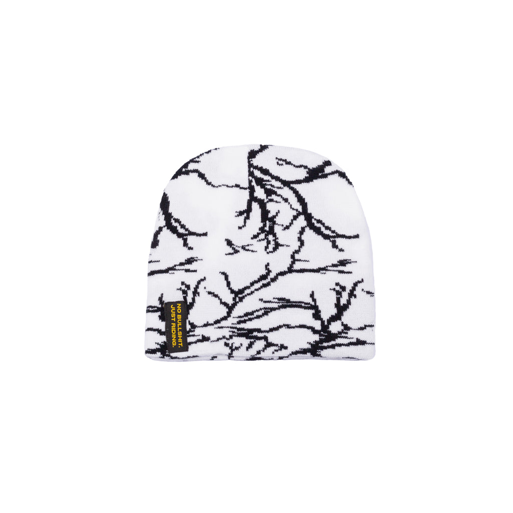 Stay warm and stylish with the NG Graphic Beanie. Featuring bold graphics and our signature 'No Bullshit, Just Riding' label, it's perfect for snowboarding, skiing, and everyday winter wear. 100% acrylic for comfort and durability. Shop now! White on Snow. Flash.