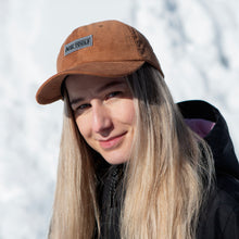 Load image into Gallery viewer, NGtools Corduroy Dad Cap. Style and fashion in one. Style on Snow. Fashion on Snow. Fashion on Snowboard and Ski. Purple Color. Snowboard Buyers Guide. In Absolut Park. On model. 