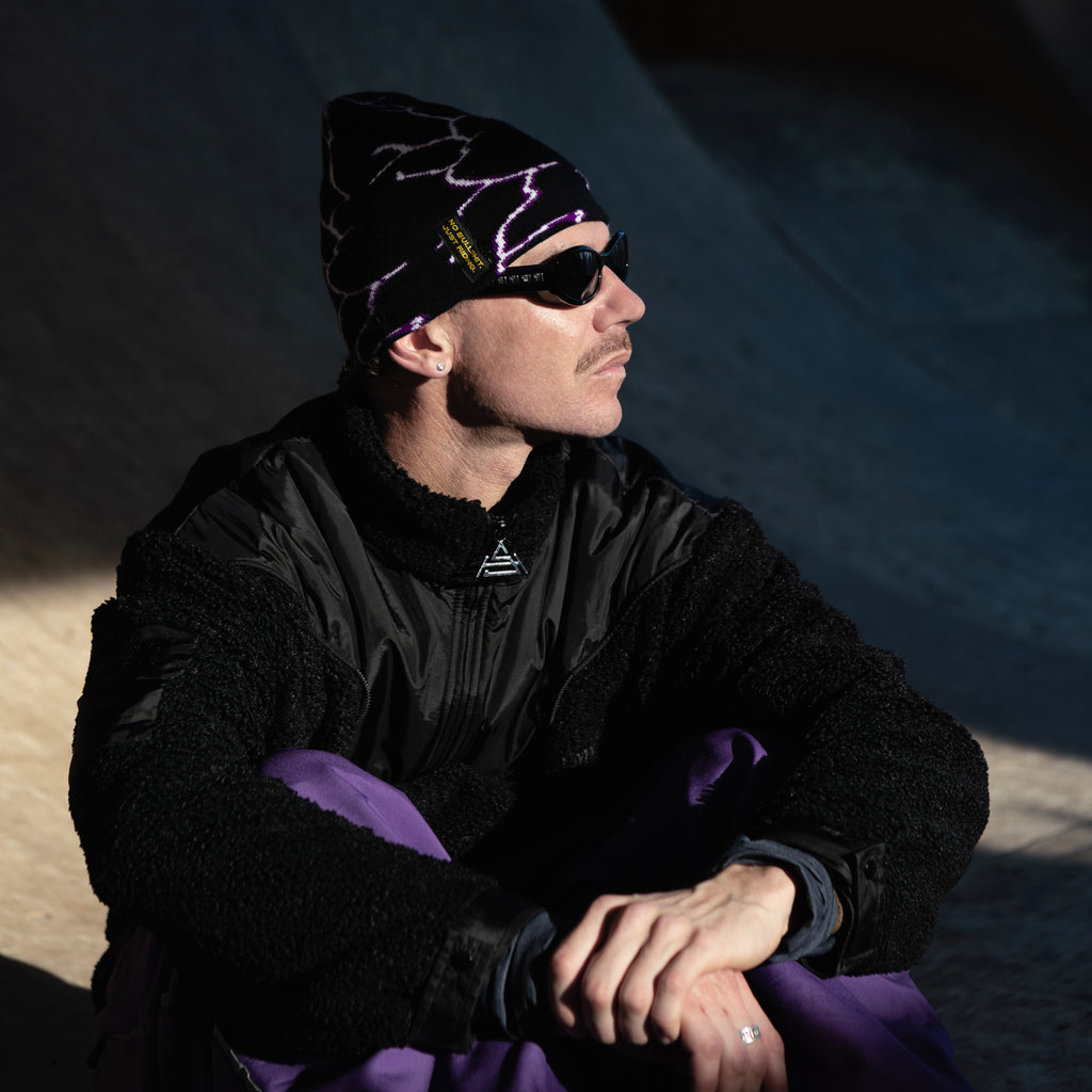 Stay warm and stylish with the NG Graphic Beanie. Featuring bold graphics and our signature 'No Bullshit, Just Riding' label, it's perfect for snowboarding, skiing, and everyday winter wear. 100% acrylic for comfort and durability. Shop now! White on Snow. In Absolut Park Chillhouse.