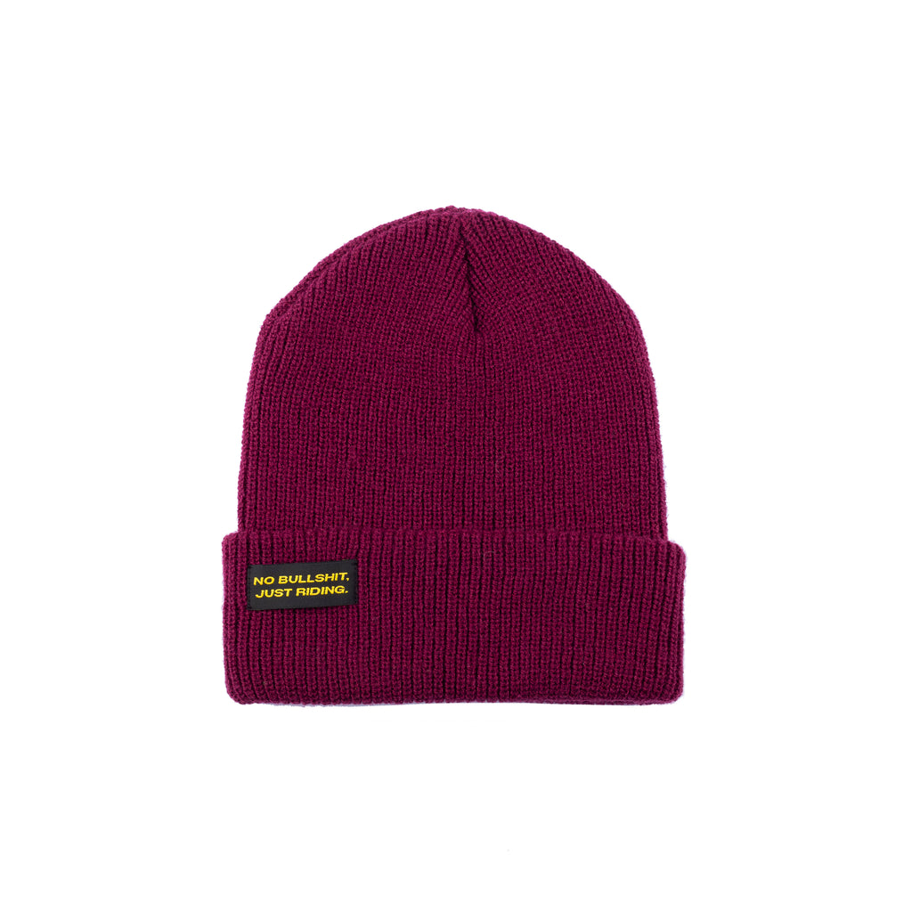 Discover our Adult Classic Beanie—100% acrylic, snug fit, perfect for snowboarding, skiing, and cold-weather wear. Available in vibrant colors with the "No bullshit, just riding" label. Stay warm and stylish on every winter adventure. Ideal for adults who love bold style! Model. NGtool best multitool, binding tool on Snow. Beauty Burgundy color.