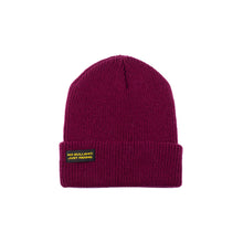 Load image into Gallery viewer, Discover our Adult Classic Beanie—100% acrylic, snug fit, perfect for snowboarding, skiing, and cold-weather wear. Available in vibrant colors with the &quot;No bullshit, just riding&quot; label. Stay warm and stylish on every winter adventure. Ideal for adults who love bold style! Model. NGtool best multitool, binding tool on Snow. Beauty Burgundy color.