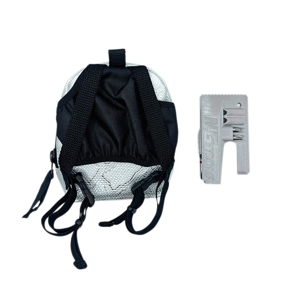 Detail shot of NGtools binding bag in Silver Snake edition, highlighting stitching, material texture, and functional pocket design.