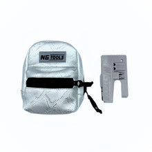 Load image into Gallery viewer, NGtools Silver Snake Designer Bag displayed outdoors on snowboard gear, showcasing premium design and protective material.
