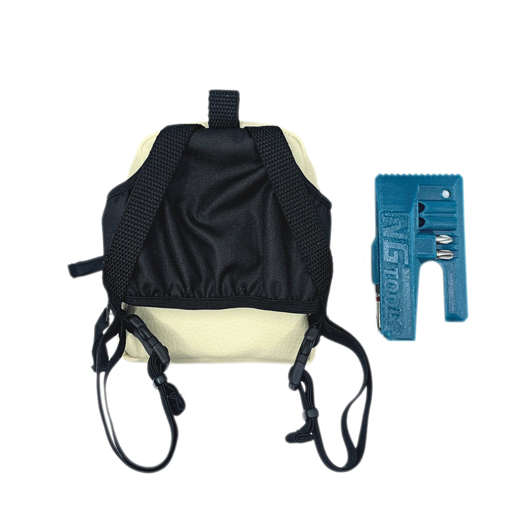 NGtools White Leather binding bag in outdoor setting attached to snowboard binding, highlighting minimalist premium look.
