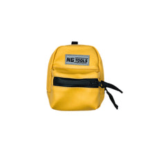 Load image into Gallery viewer, NGtools Snowboard Binding Bag in yellow faux leather, compact and waterproof, securely attached to a snowboard binding. Perfect for carrying essentials on the mountain.