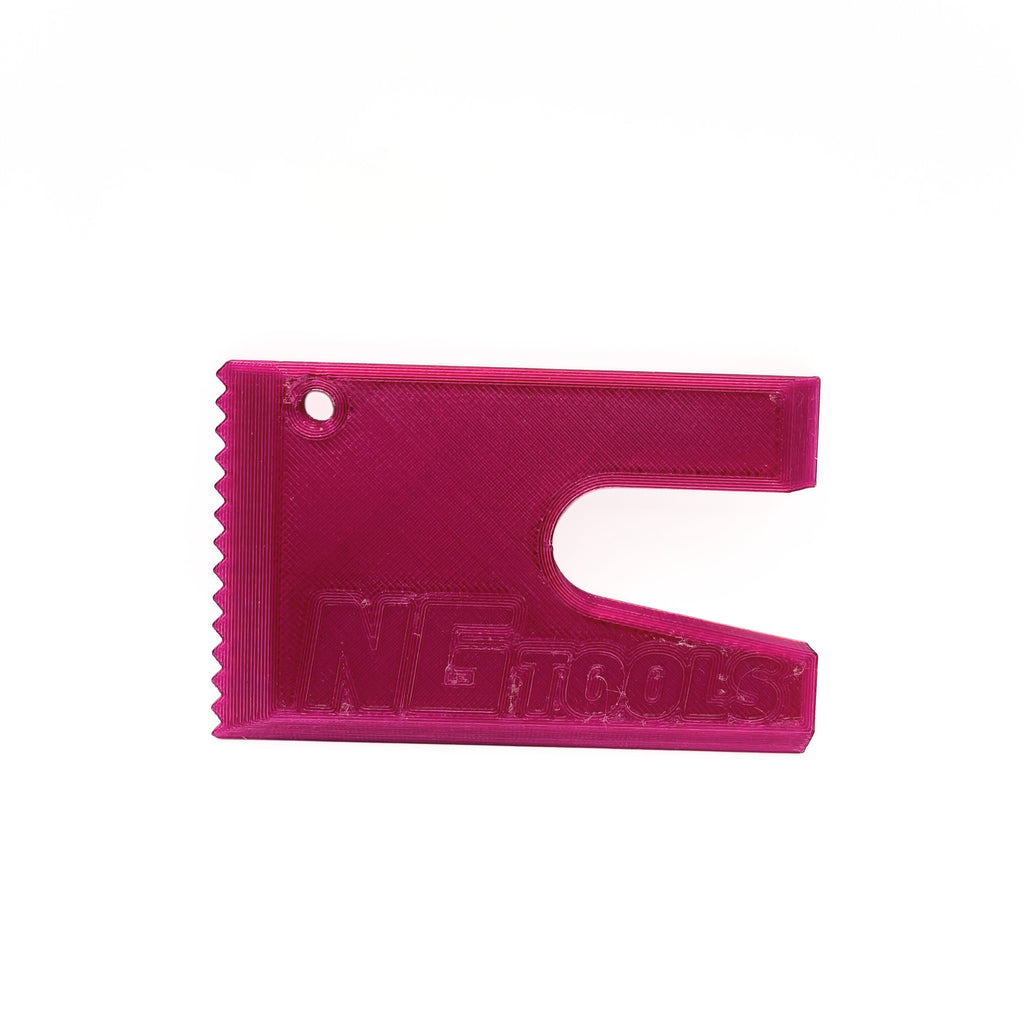 Compact purple NG snowboard multitool for snowboarders, essential gear for quick adjustments and repairs on the slopes, lightweight and durable for snowboarding adventures.