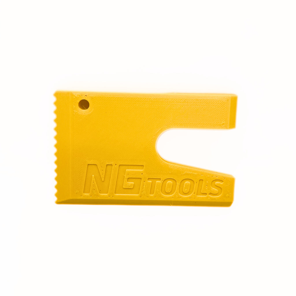 Compact yellow NG multitool for snowboarders, essential gear for quick adjustments and repairs on the slopes, lightweight and durable for snowboarding adventures.