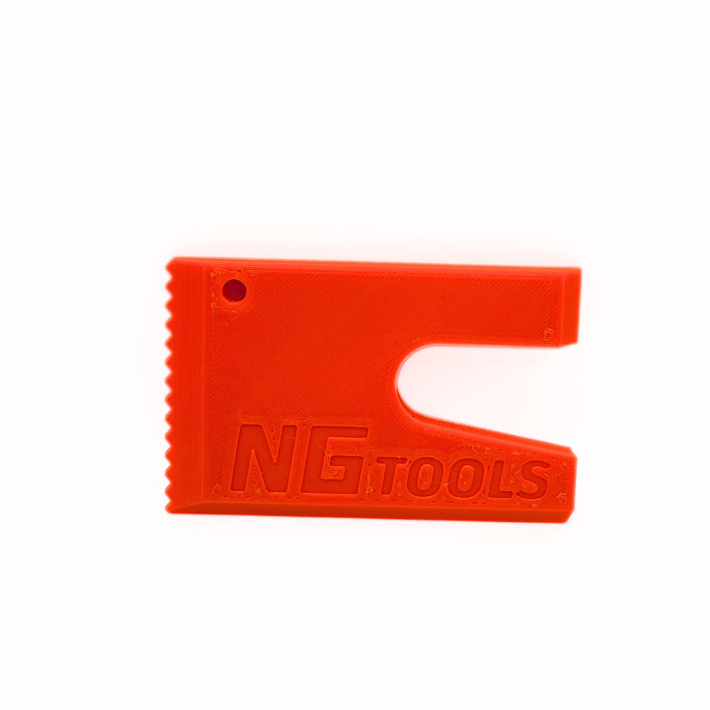 Compact orange NG snowboard multitool for snowboarders, essential gear for quick adjustments and repairs on the slopes, lightweight and durable for snowboarding adventures.