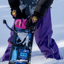 Snowboard setup with pink NG Binding Bag and Compact Tool – rider-tested gear by NG Tools