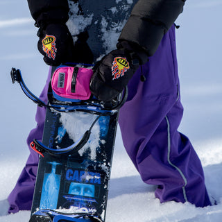 Snowboard setup with pink NG Binding Bag and Compact Tool – rider-tested gear by NG Tools